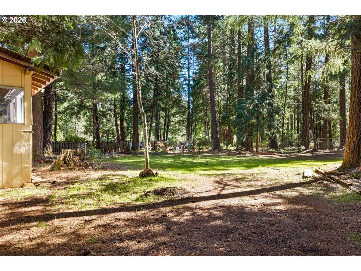 280 Cobalt Drive O'Brien, OR 97523 - Photo 25 of 27 a view of a yard with swimming pool