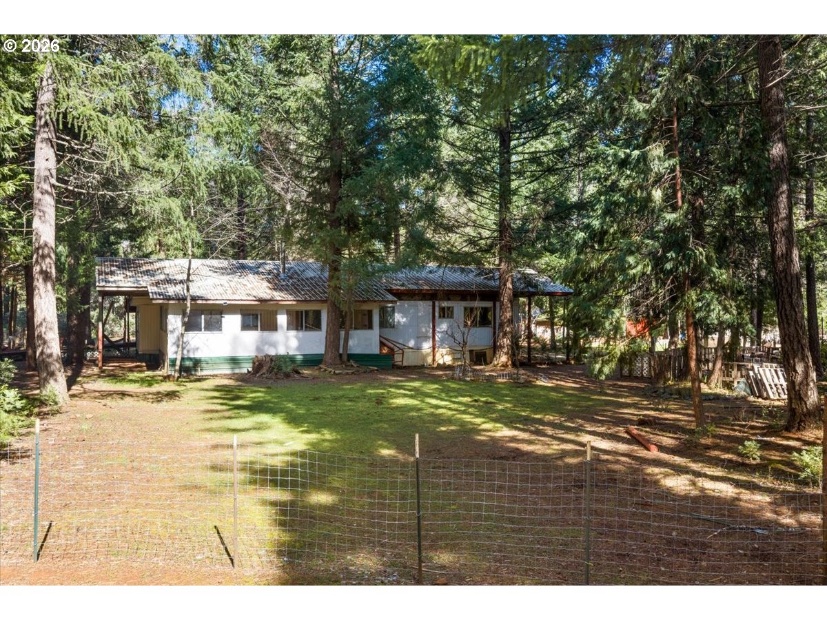 280 Cobalt Drive O'Brien, OR 97523 - Photo 26 of 27 a view of an house with backyard space and balcony
