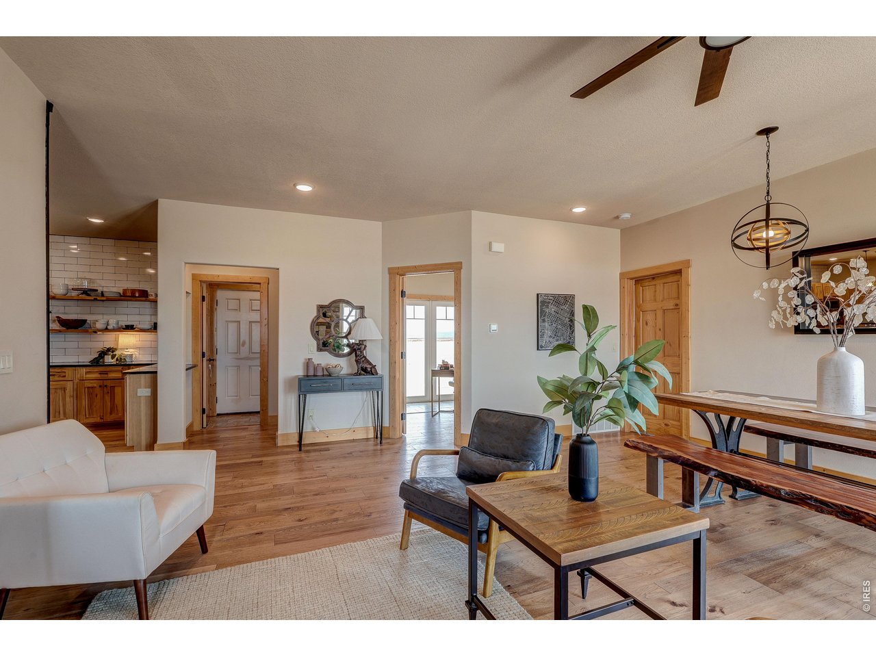 18298 Romar Ranch Road Carr, CO 80612 - Photo 28 of 49 a living room with furniture and wooden floor