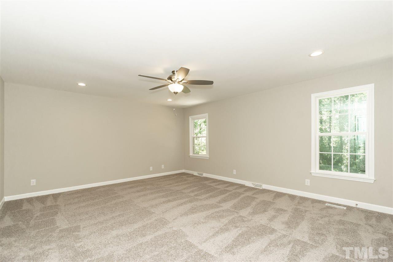 7204 Grist Mill Road Raleigh, NC 27615 - Photo 17 of 30 a view of an empty room with a window
