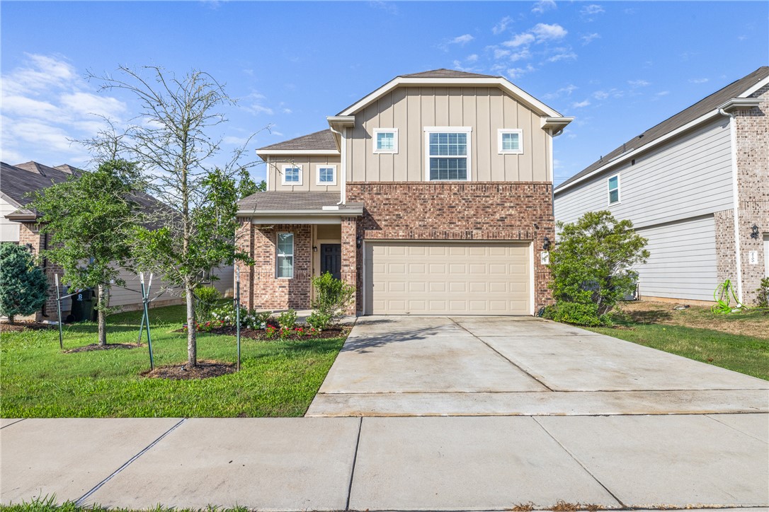 4702 Nopalitos Way Bryan, TX 77807 - Photo 4 of 27 a front view of a house with a yard