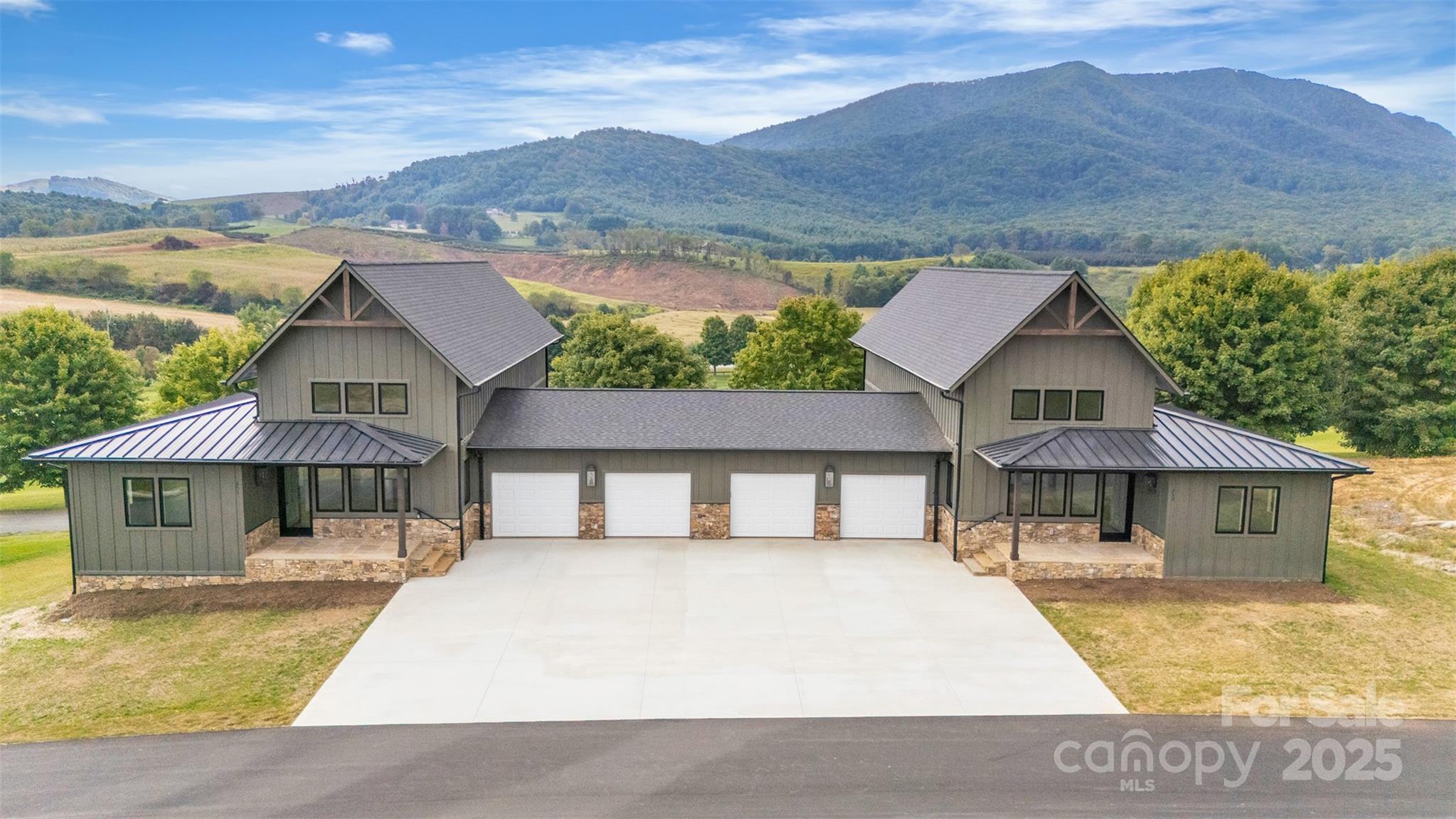 Tbd Range View Drive Jefferson, NC 28640 - Photo 1 of 46 a front view of a house with swimming pool