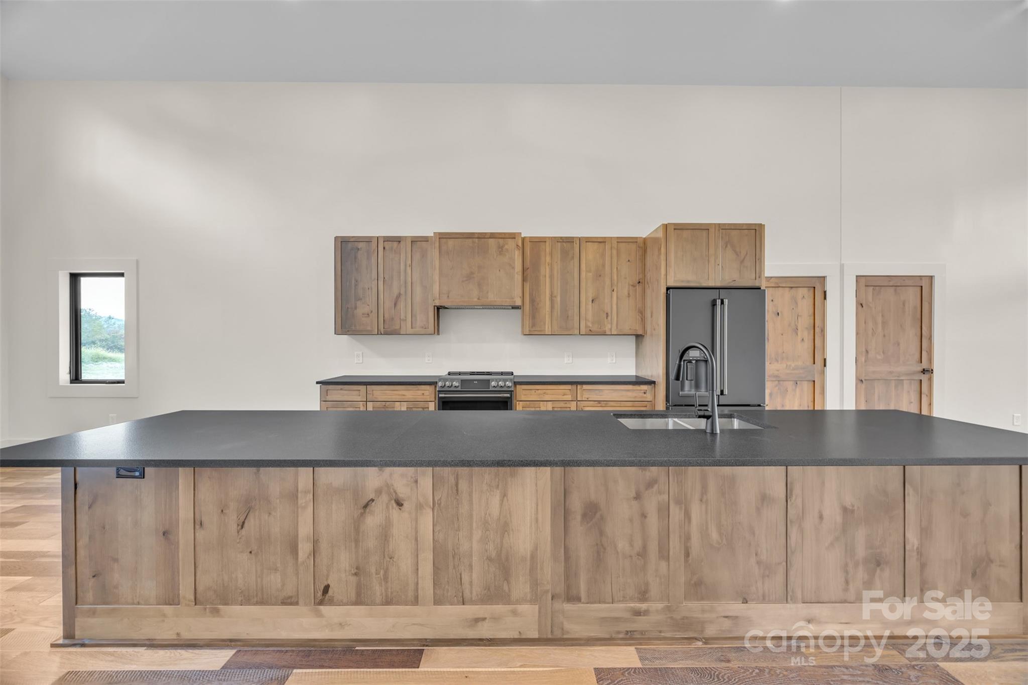 Tbd Range View Drive Jefferson, NC 28640 - Photo 11 of 46 a kitchen with kitchen island granite countertop a sink and a granite counter tops