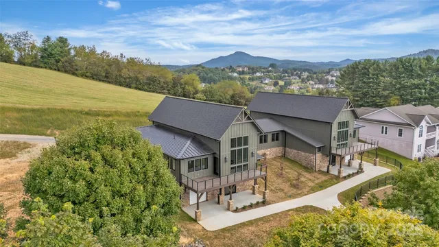 an aerial view of a house with a garden