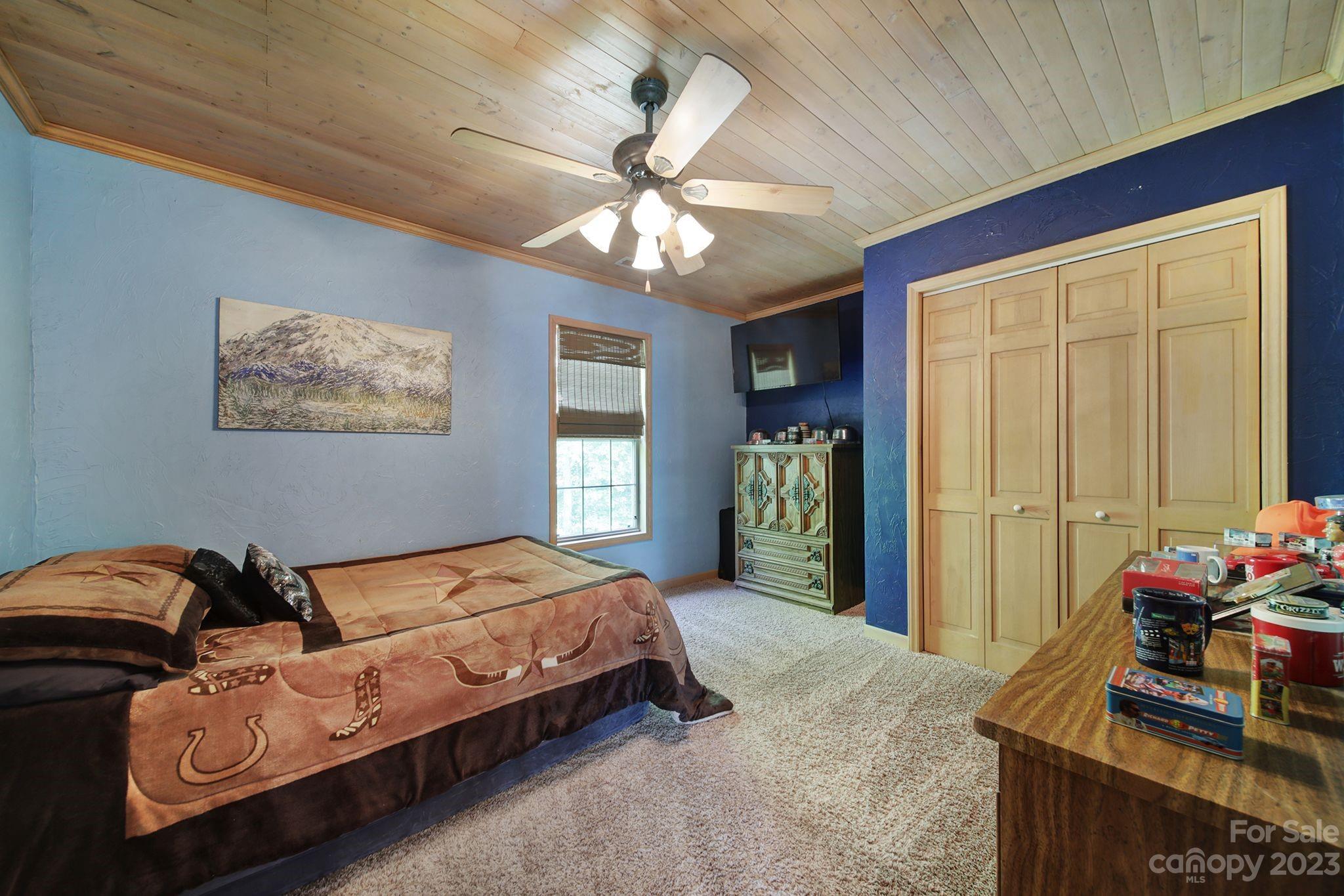 332 Boggs Road Thomasville, NC 27360 - Photo 16 of 41 a bedroom with bed and window