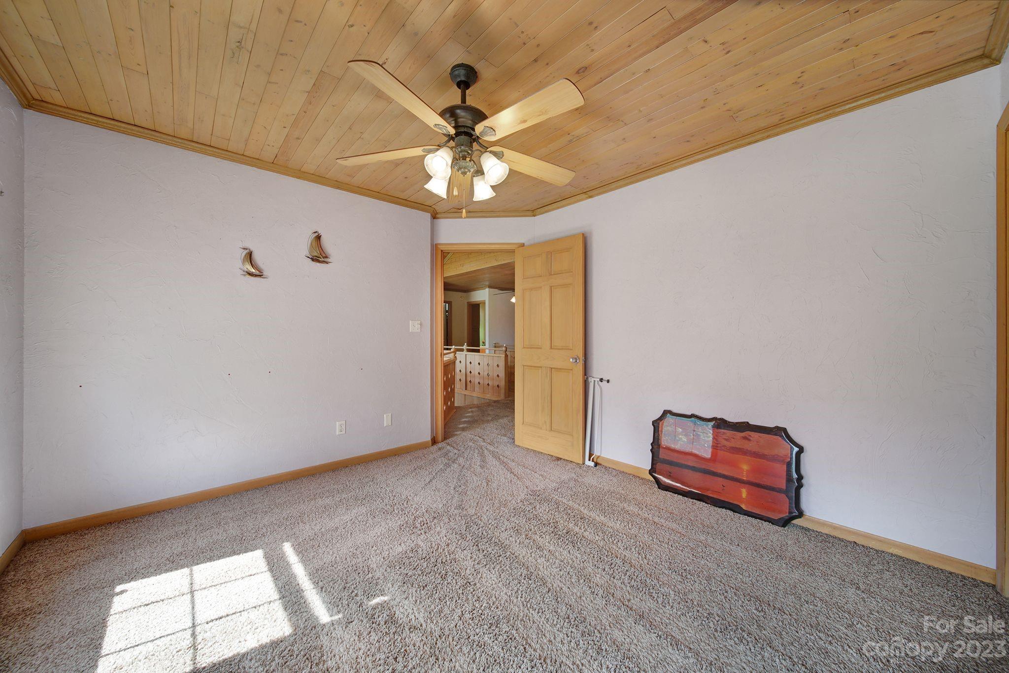 332 Boggs Road Thomasville, NC 27360 - Photo 18 of 41 a view of room with window and ceiling fan