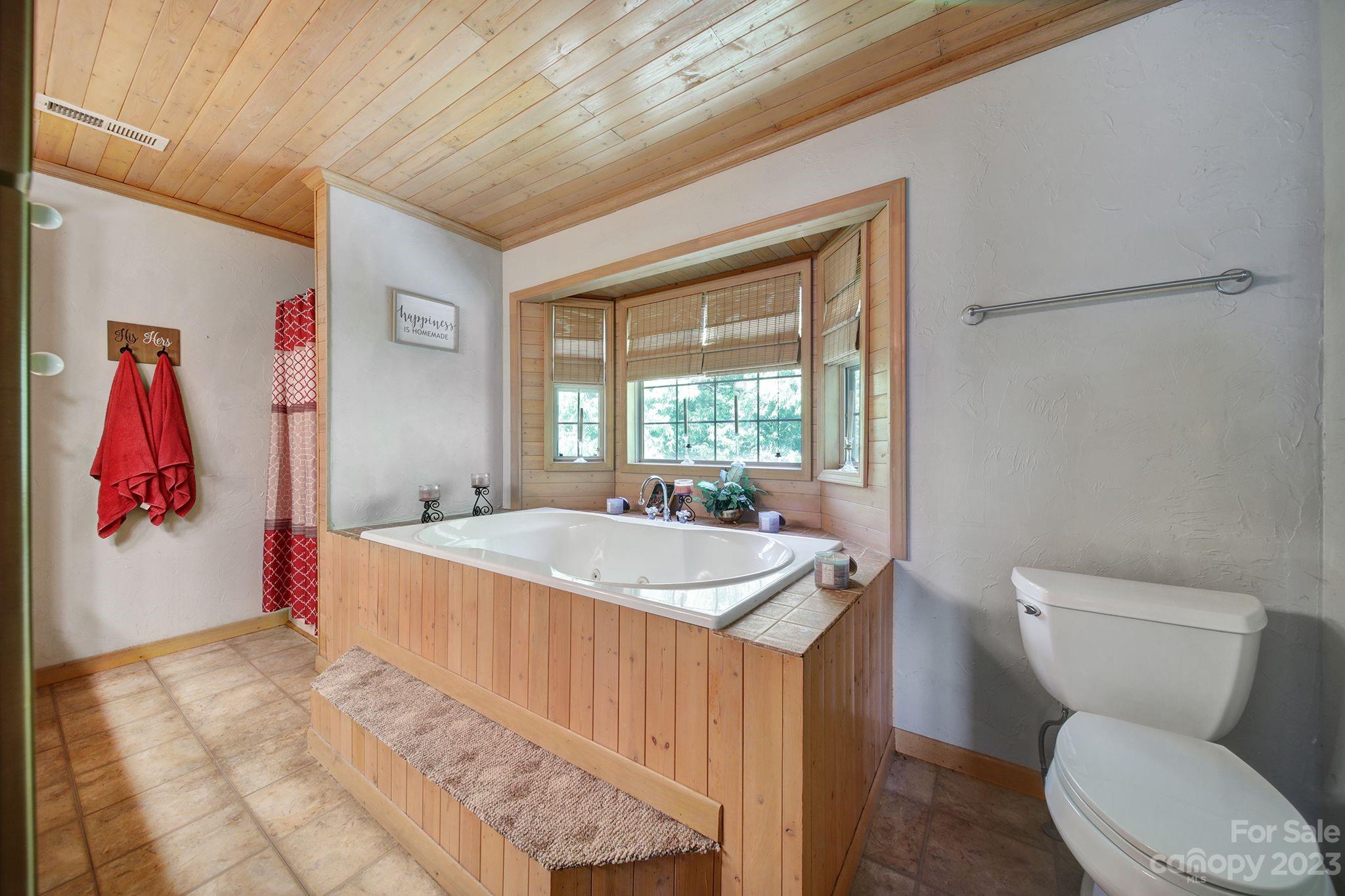 332 Boggs Road Thomasville, NC 27360 - Photo 23 of 41 a bathroom with a sink a toilet and shower