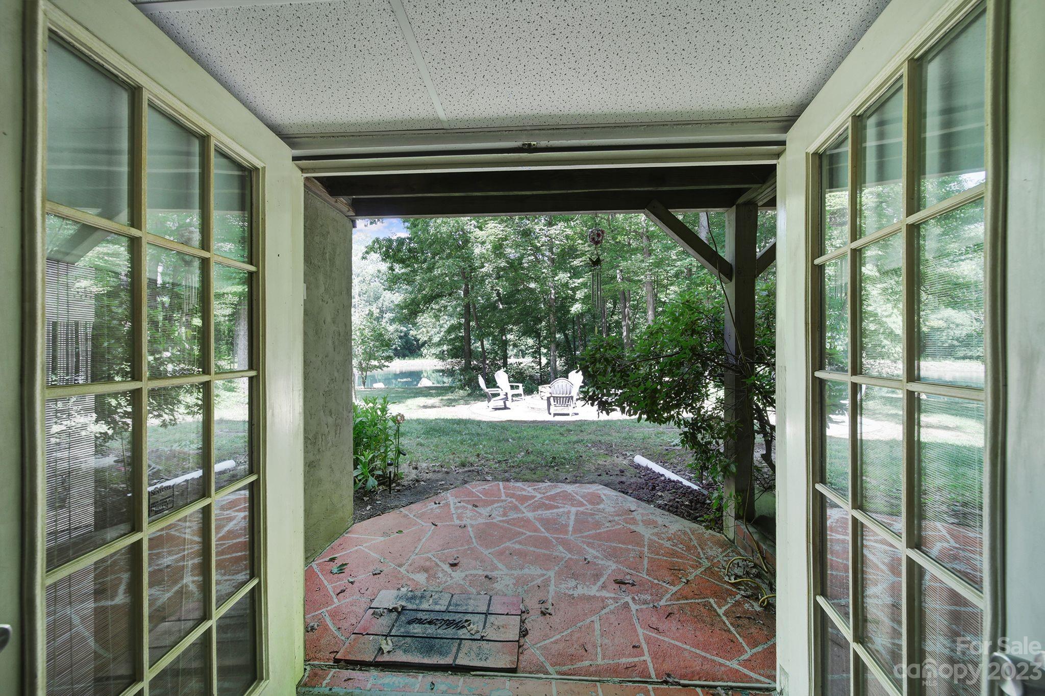 332 Boggs Road Thomasville, NC 27360 - Photo 30 of 41 a view of a porch in the back yard