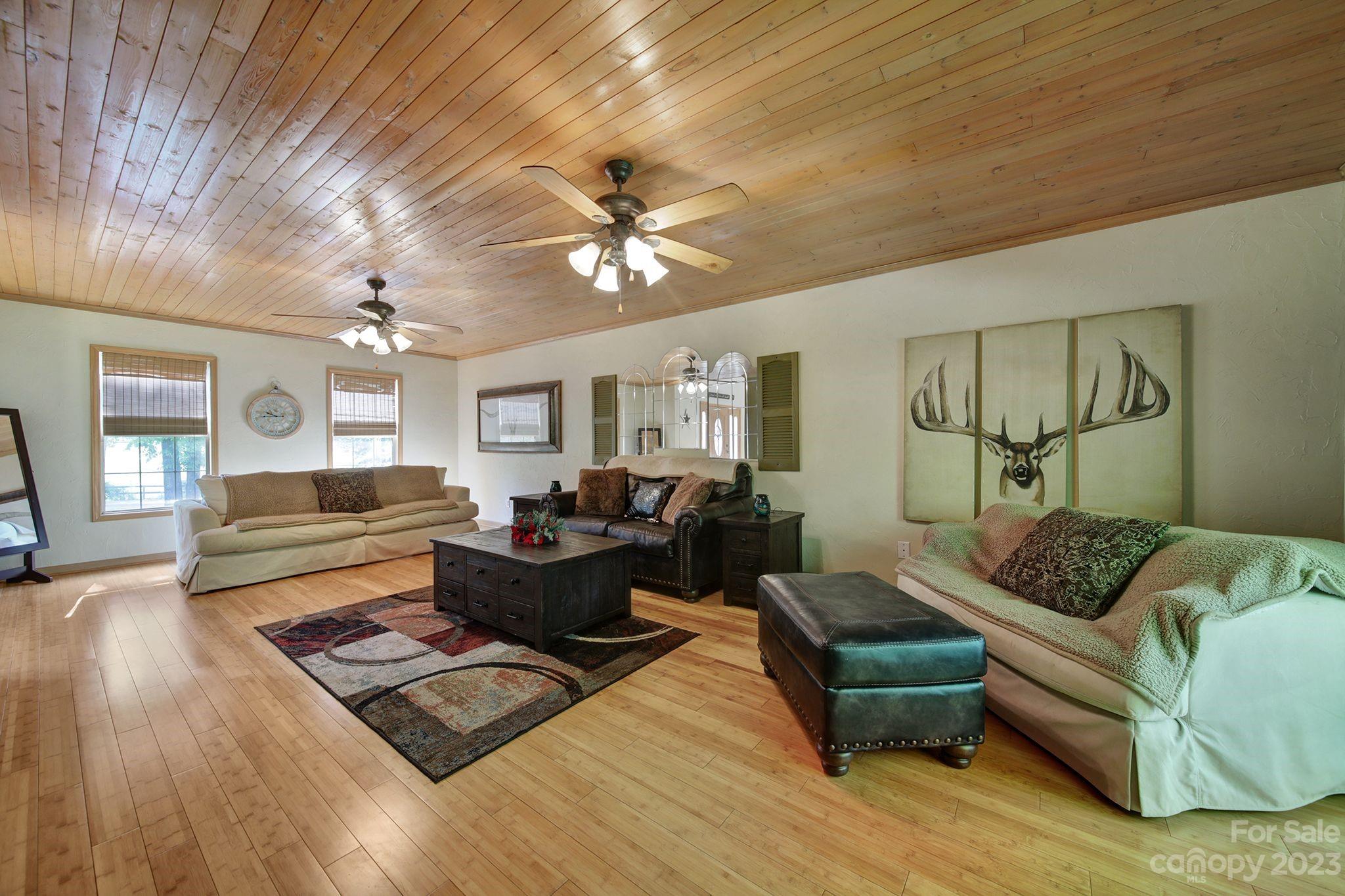 332 Boggs Road Thomasville, NC 27360 - Photo 3 of 41 a living room with furniture rug and wooden floor