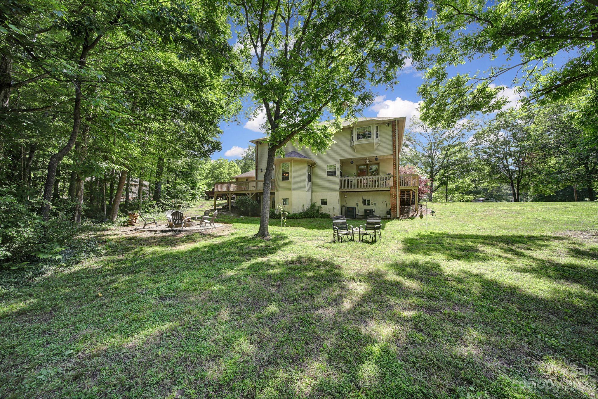 332 Boggs Road Thomasville, NC 27360 - Photo 37 of 41 a view of a house with a yard