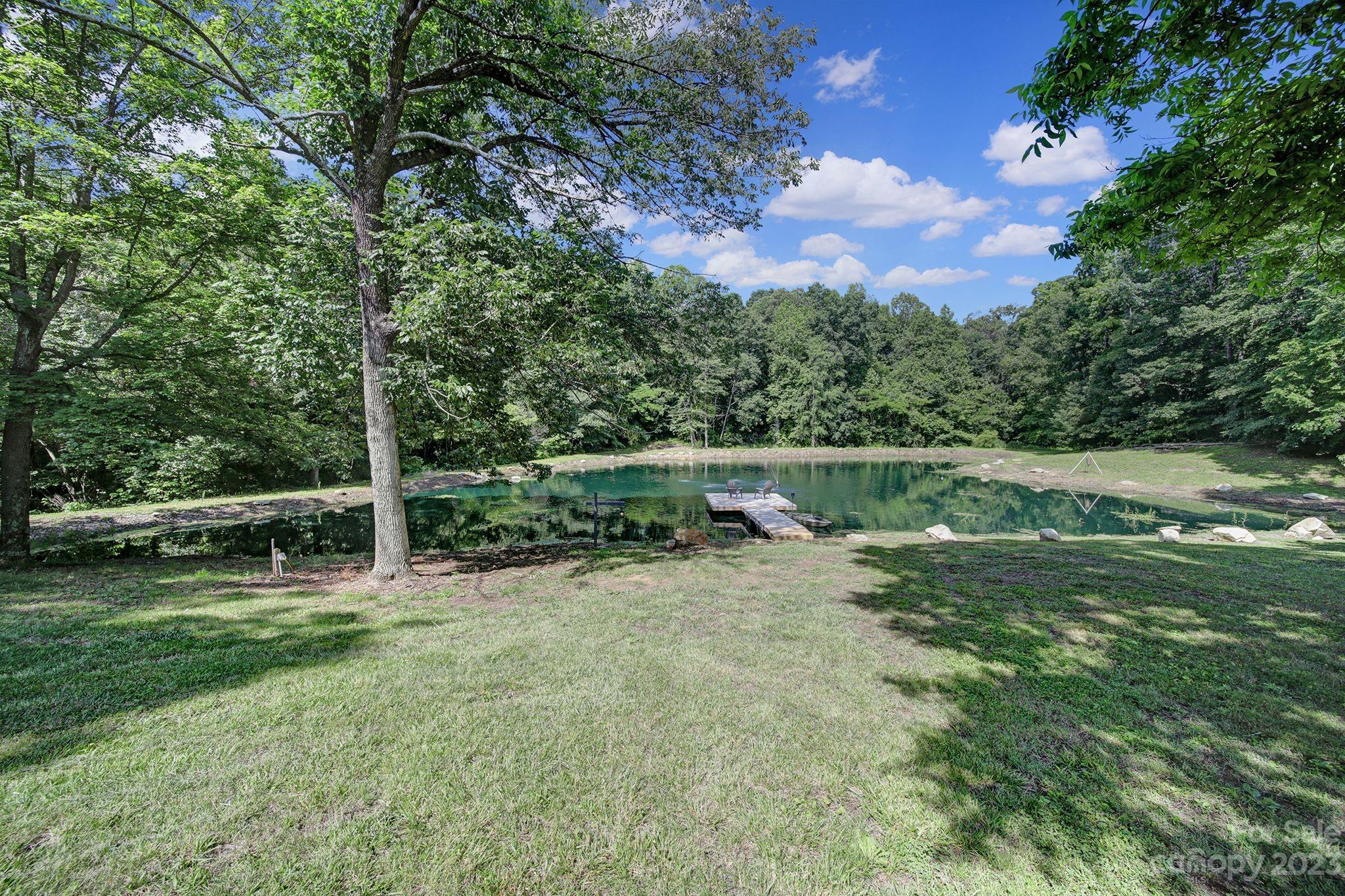 332 Boggs Road Thomasville, NC 27360 - Photo 39 of 41 a backyard of a house with lots of green space