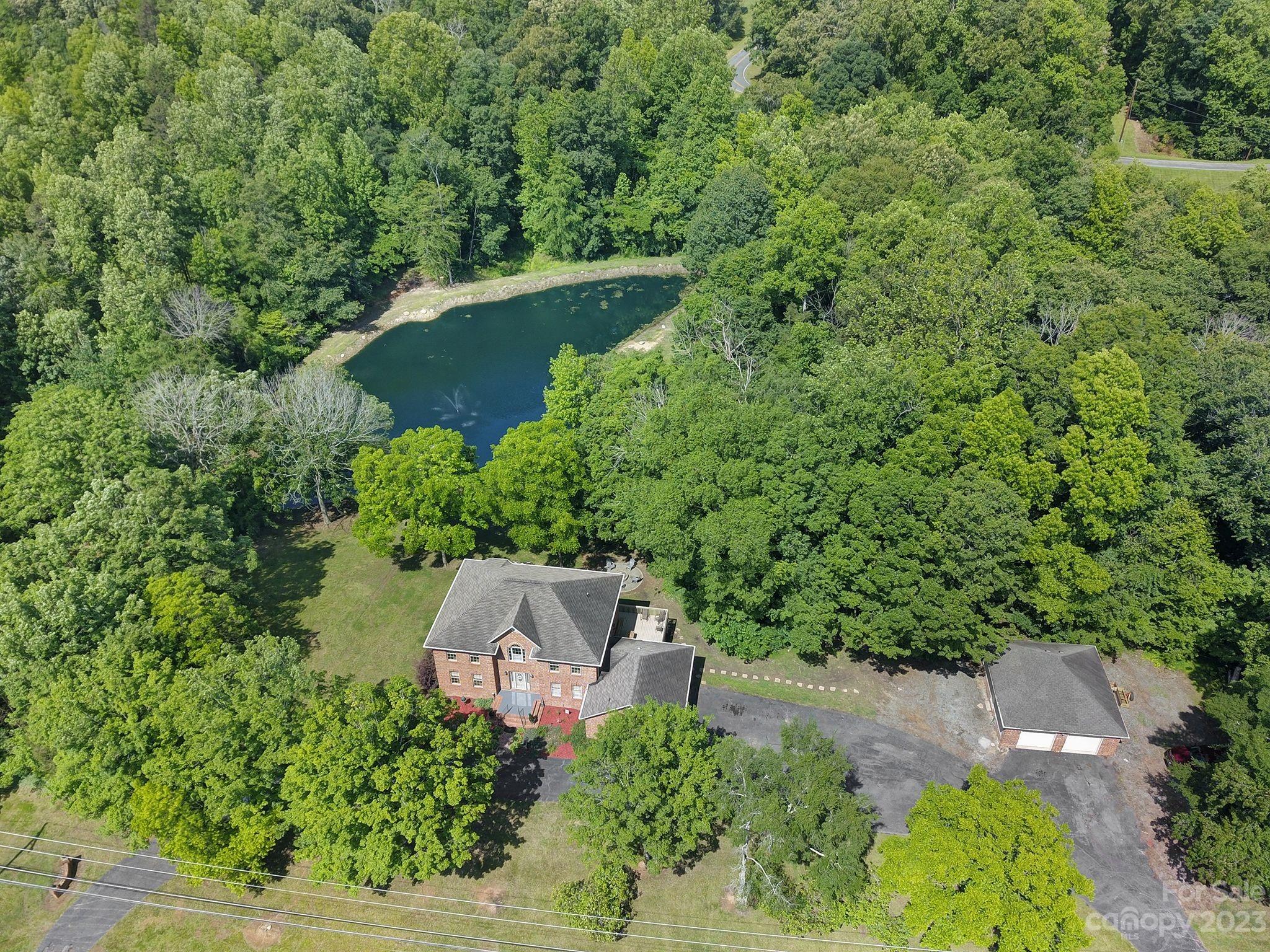 332 Boggs Road Thomasville, NC 27360 - Photo 41 of 41 an aerial view of a house with a yard and outdoor seating