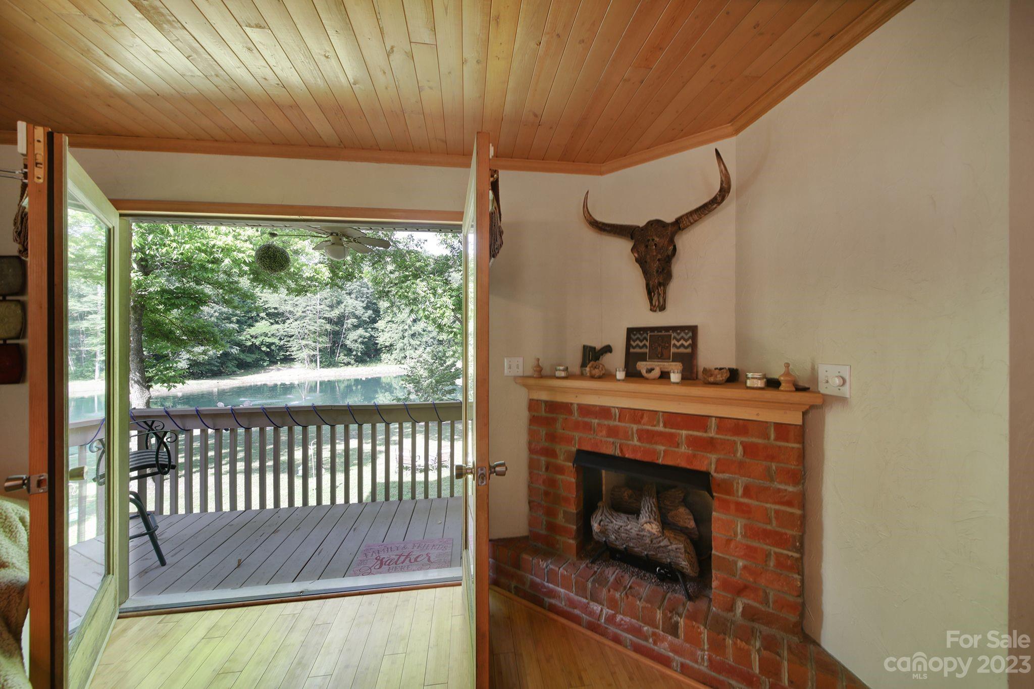 332 Boggs Road Thomasville, NC 27360 - Photo 5 of 41 a view of a livingroom with furniture and a fireplace