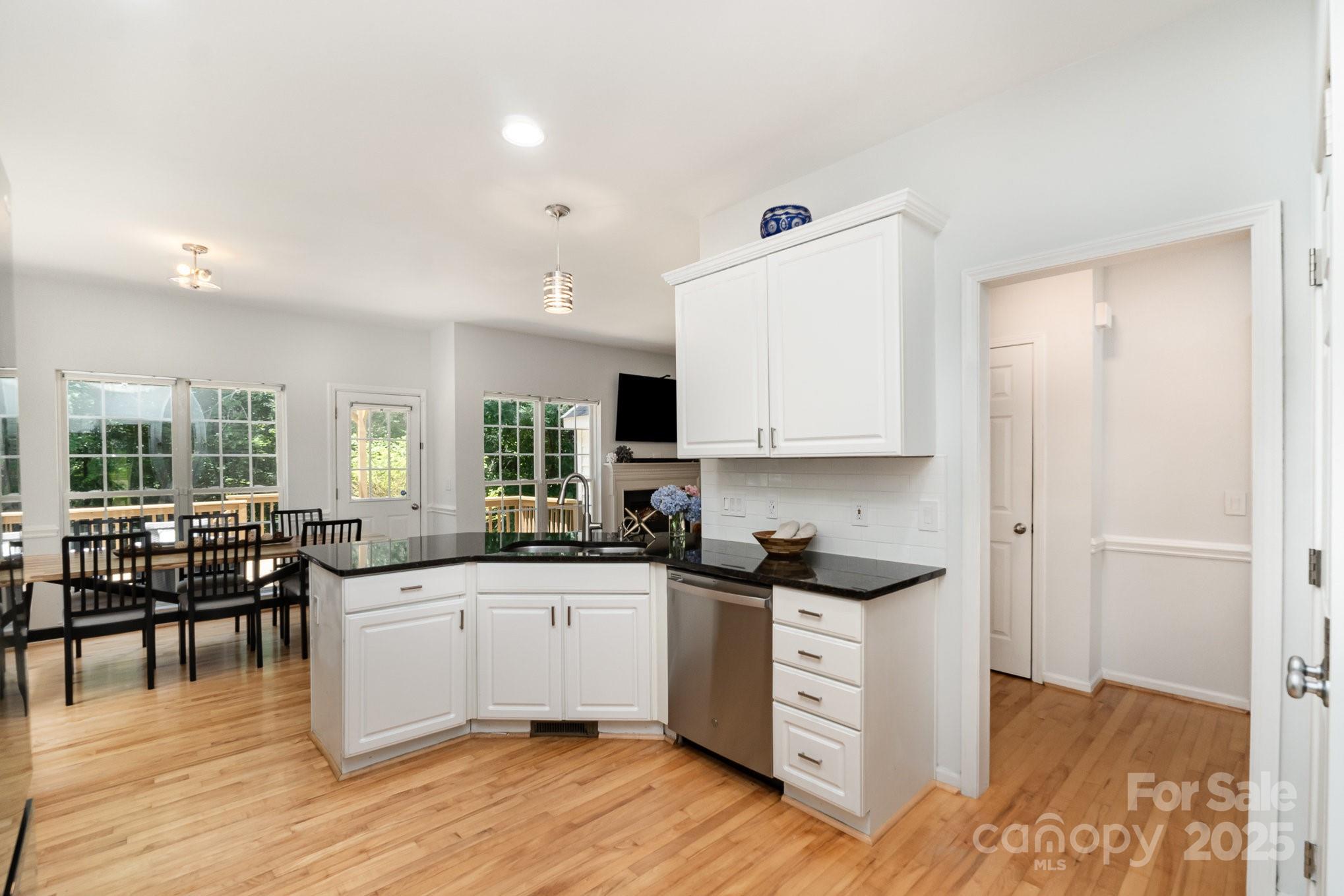 11624 Crossroads Place Concord, NC 28025 - Photo 12 of 45 a kitchen with a sink and cabinets