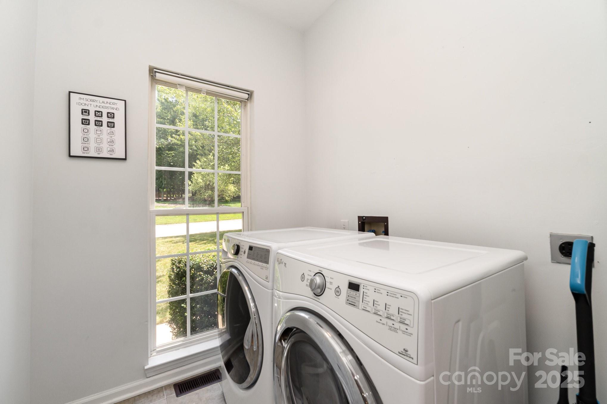 11624 Crossroads Place Concord, NC 28025 - Photo 18 of 45 a utility room with dryer and washer