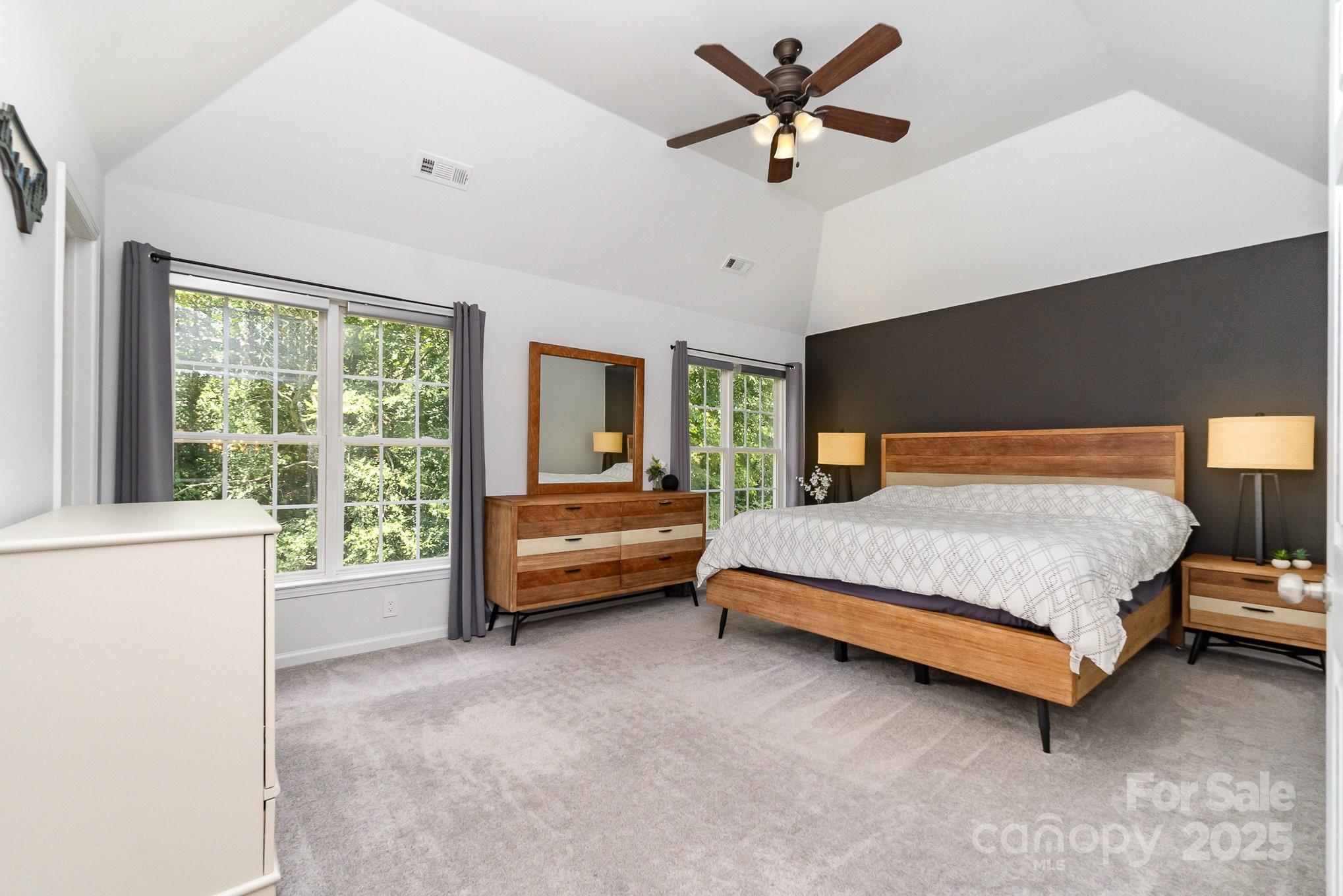 11624 Crossroads Place Concord, NC 28025 - Photo 20 of 45 a bedroom with a bed and a large window