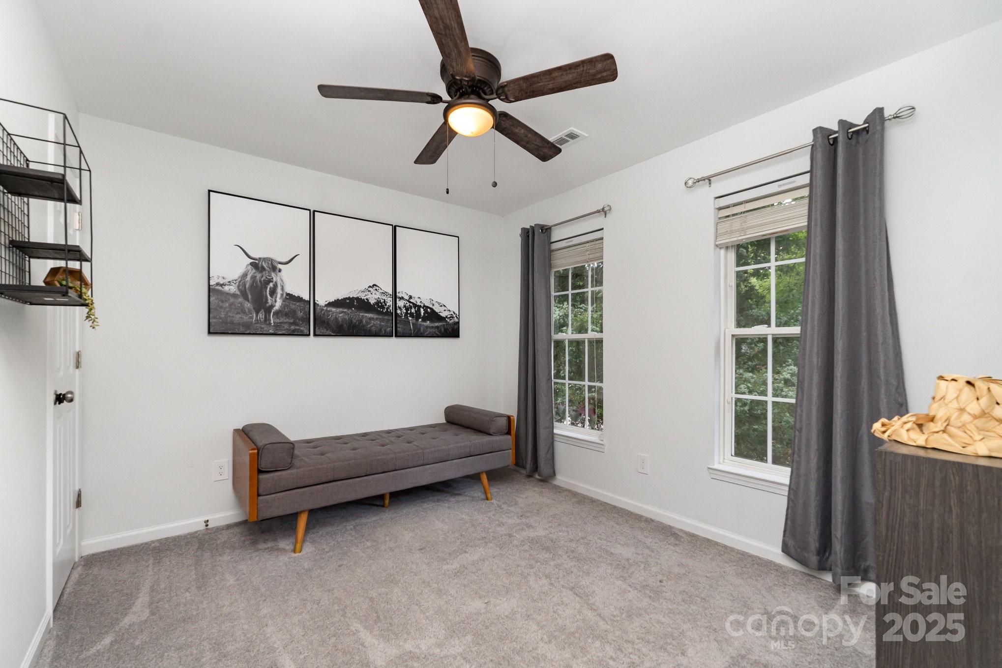 11624 Crossroads Place Concord, NC 28025 - Photo 25 of 45 a living room with furniture and a window
