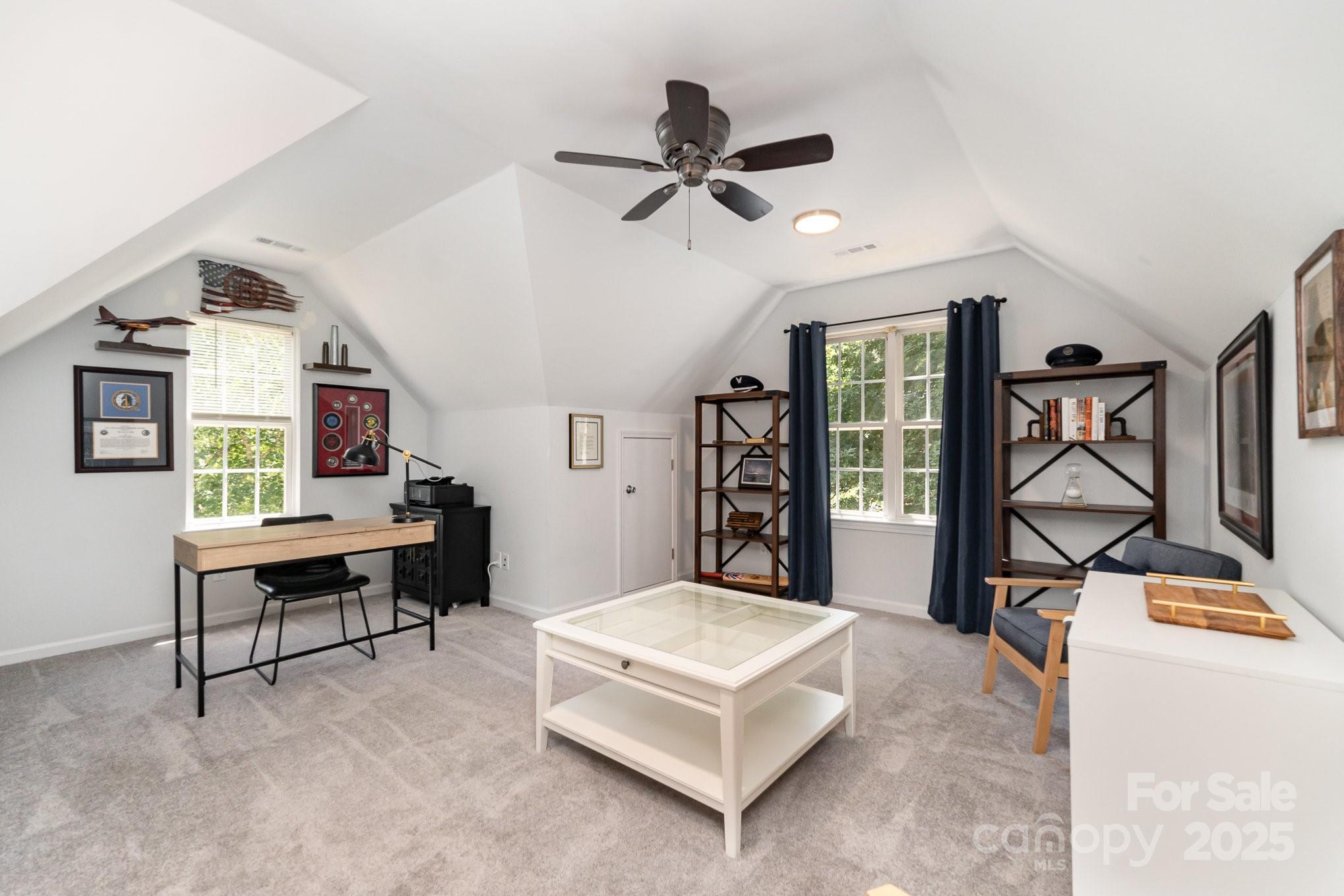 11624 Crossroads Place Concord, NC 28025 - Photo 28 of 45 a living room with furniture and a window