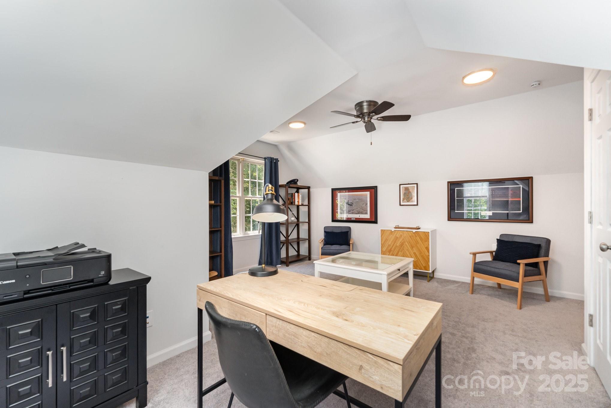 11624 Crossroads Place Concord, NC 28025 - Photo 30 of 45 a living room with furniture and a table