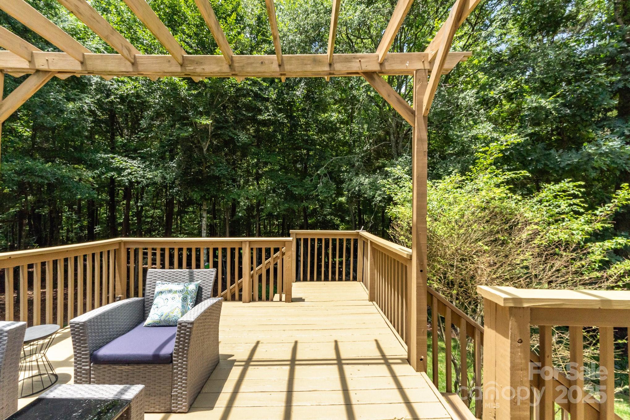 11624 Crossroads Place Concord, NC 28025 - Photo 33 of 45 a view of balcony with wooden floor and outdoor seating