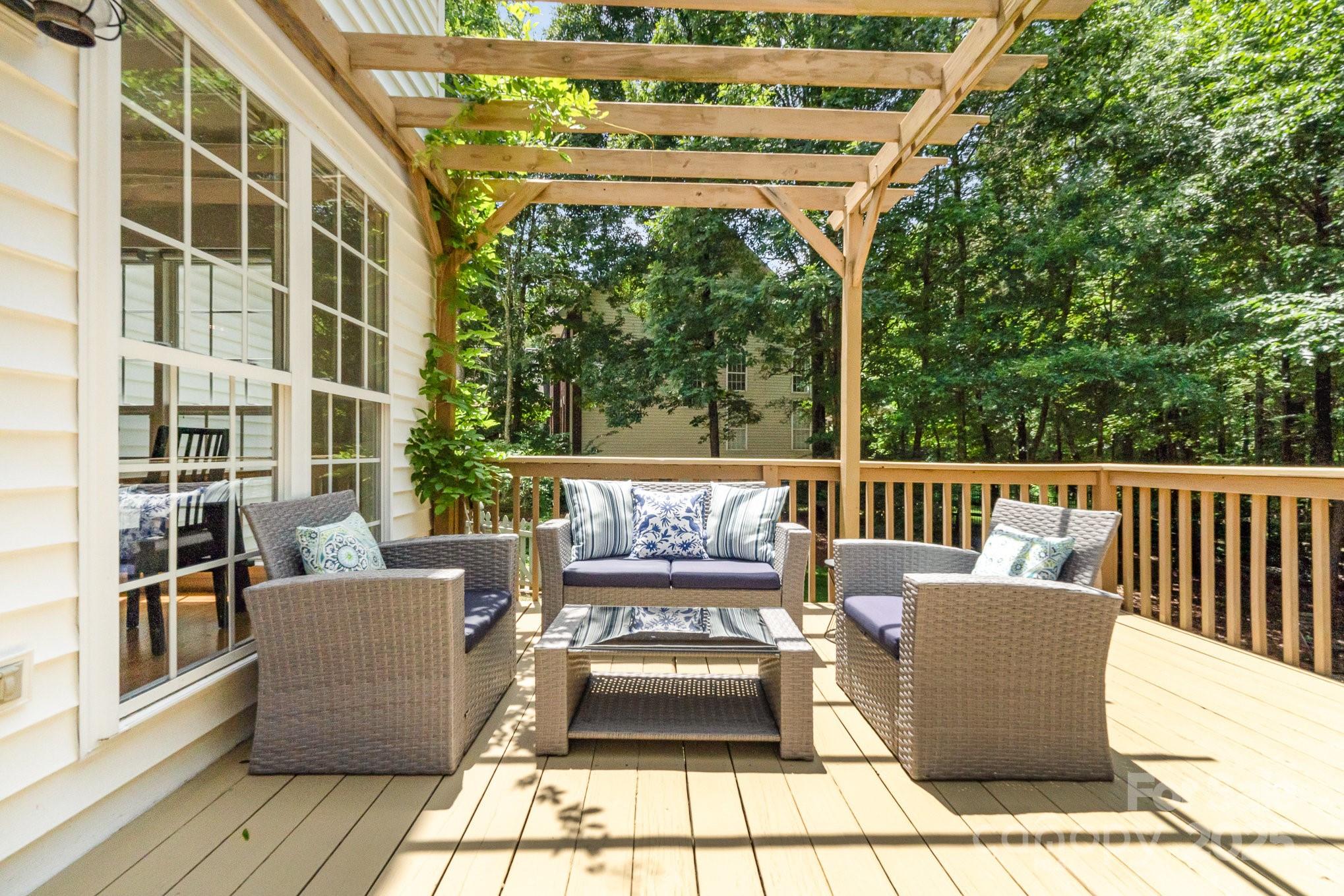11624 Crossroads Place Concord, NC 28025 - Photo 34 of 45 a view of a chair and tables in the balcony