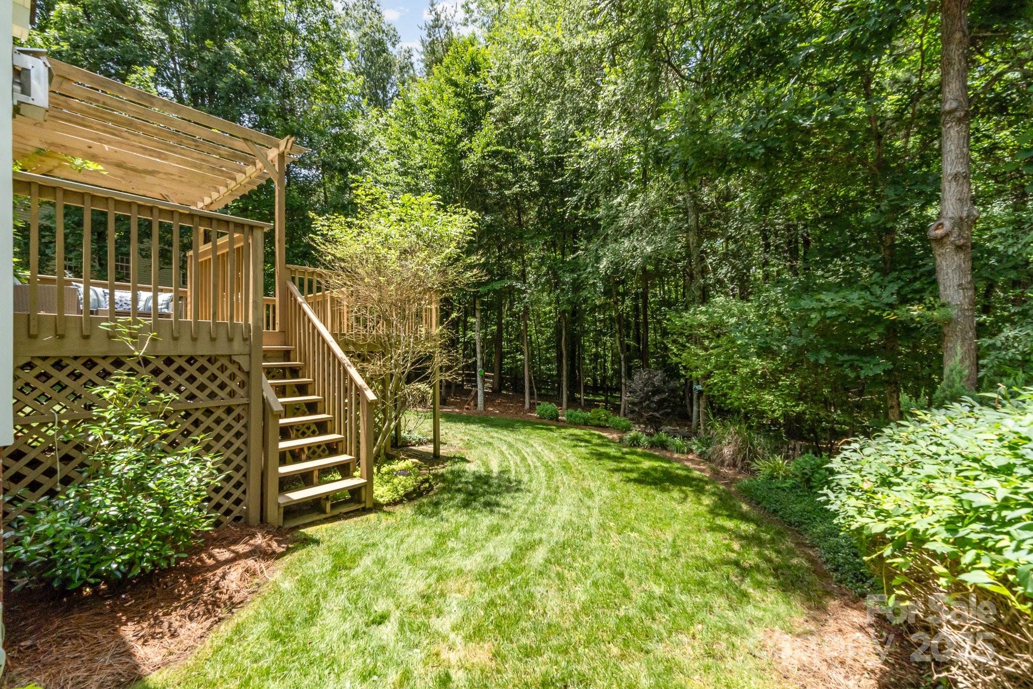 11624 Crossroads Place Concord, NC 28025 - Photo 36 of 45 a view of a house with a small deck