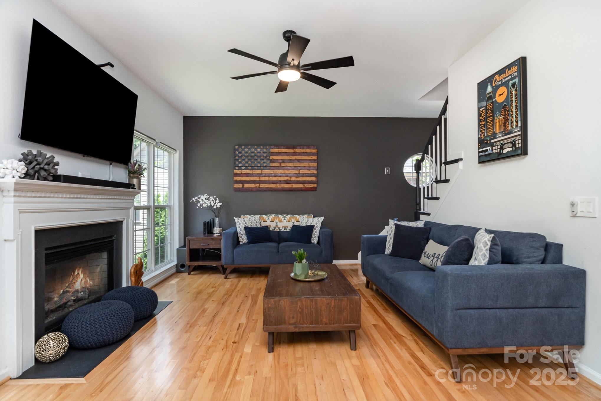 11624 Crossroads Place Concord, NC 28025 - Photo 4 of 45 a living room with furniture and a fireplace