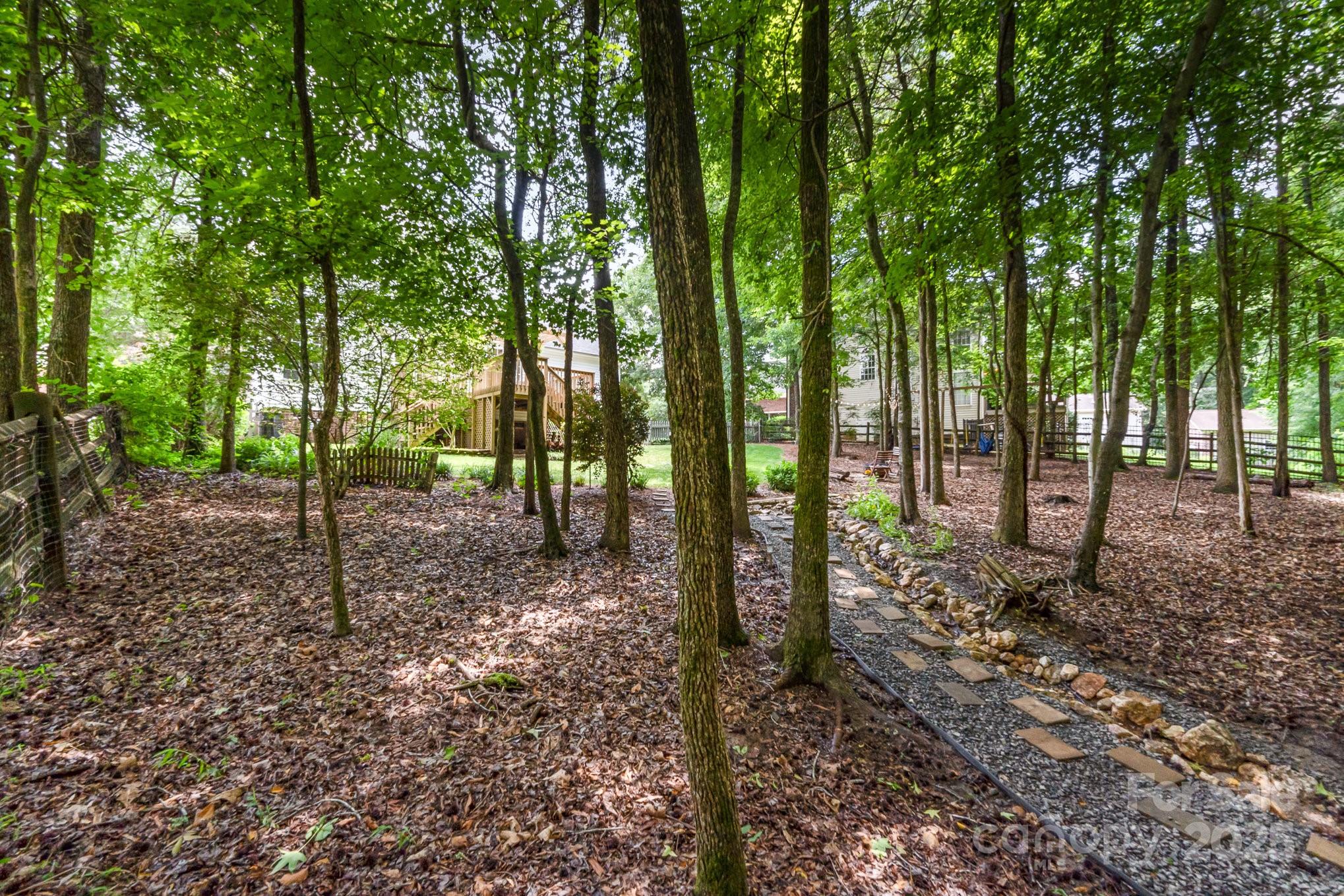 11624 Crossroads Place Concord, NC 28025 - Photo 42 of 45 a view of outdoor space with lots of trees