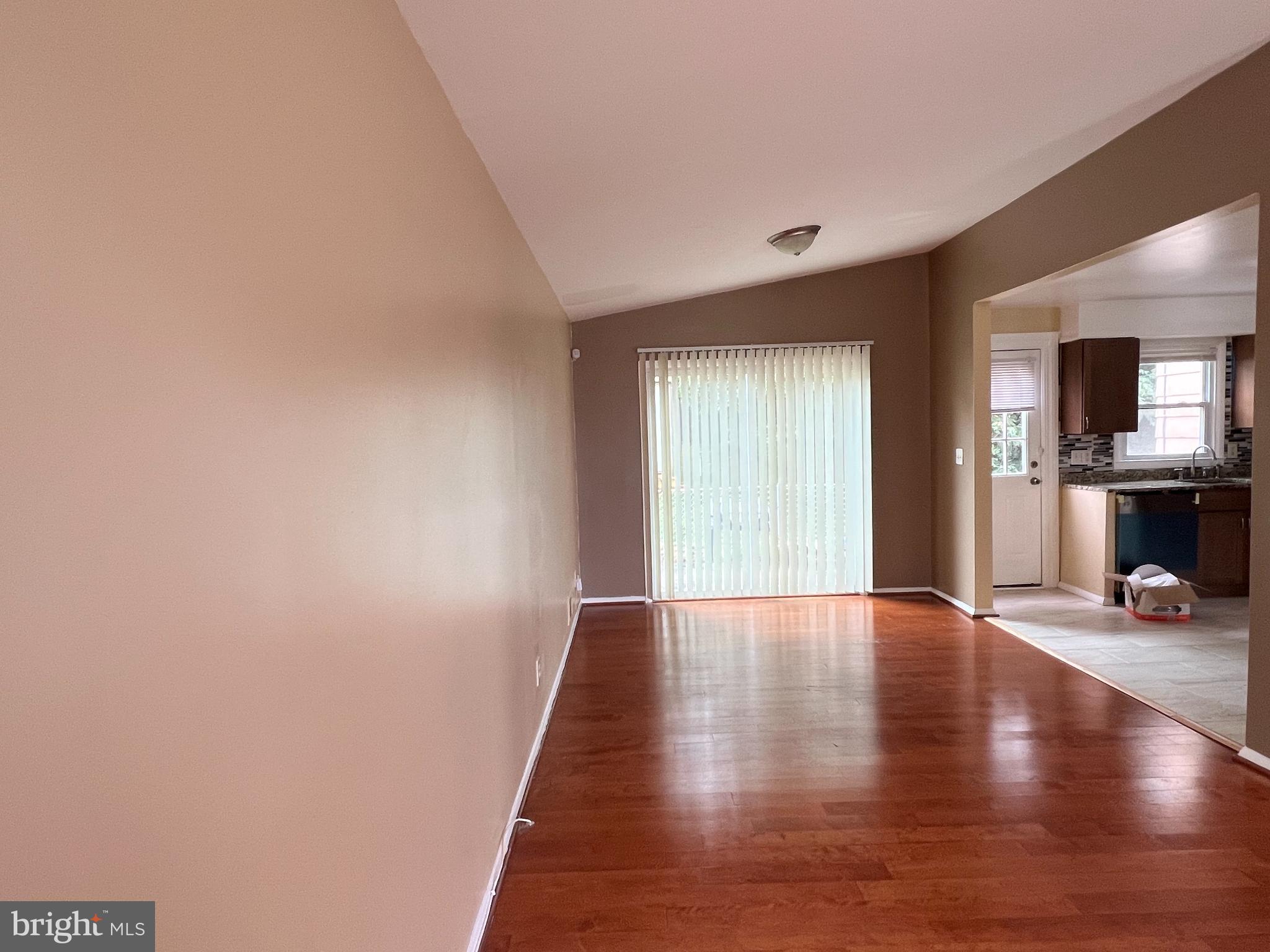 8503 Stevenswood Road Windsor Mill, MD 21244 - Photo 11 of 18 Spacious living area with natural light.