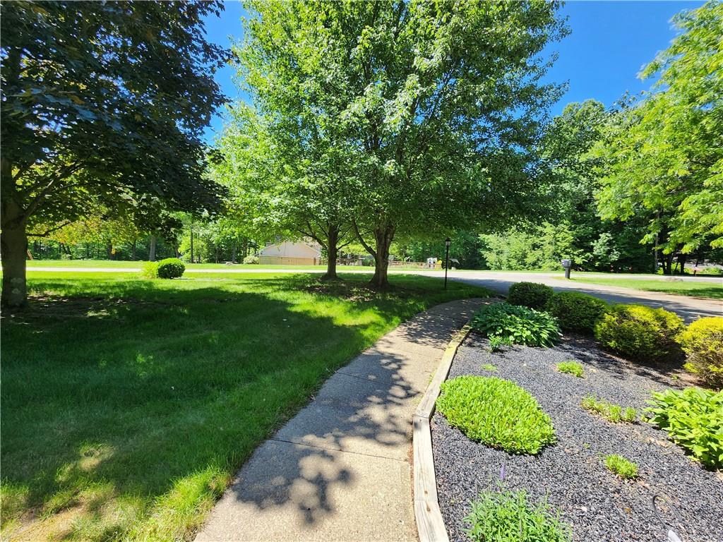 911 Aztec Trail Mercer, PA 16137 - Photo 3 of 46 a view of a park with large trees