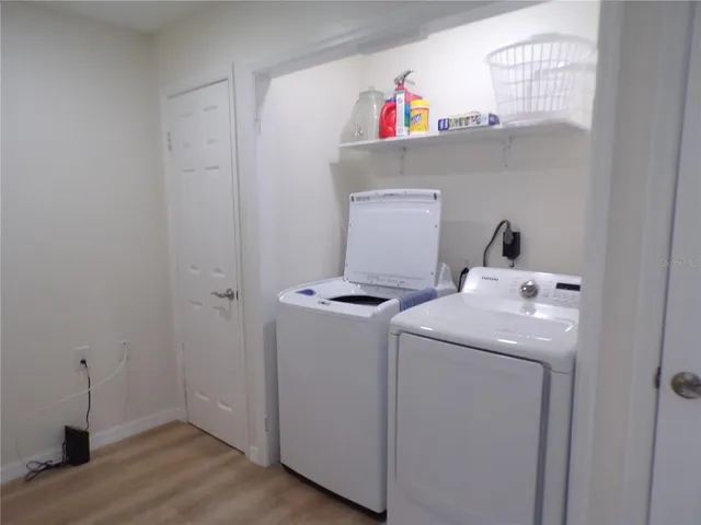a utility room with dryer and washer