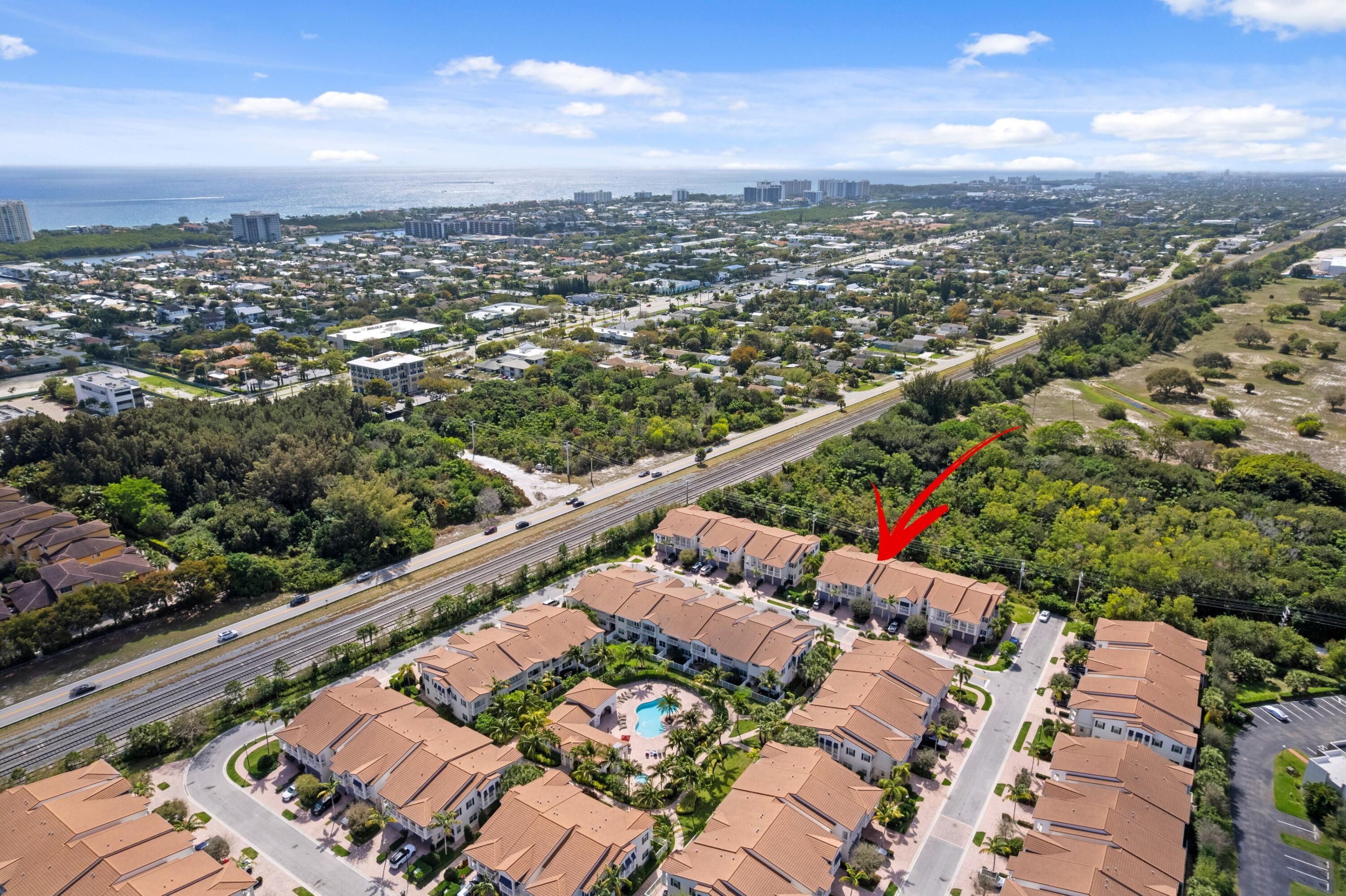100 Northwest 69th Circle, Unit 82 Boca Raton, FL 33487 - Photo 28 of 42 an aerial view of a city