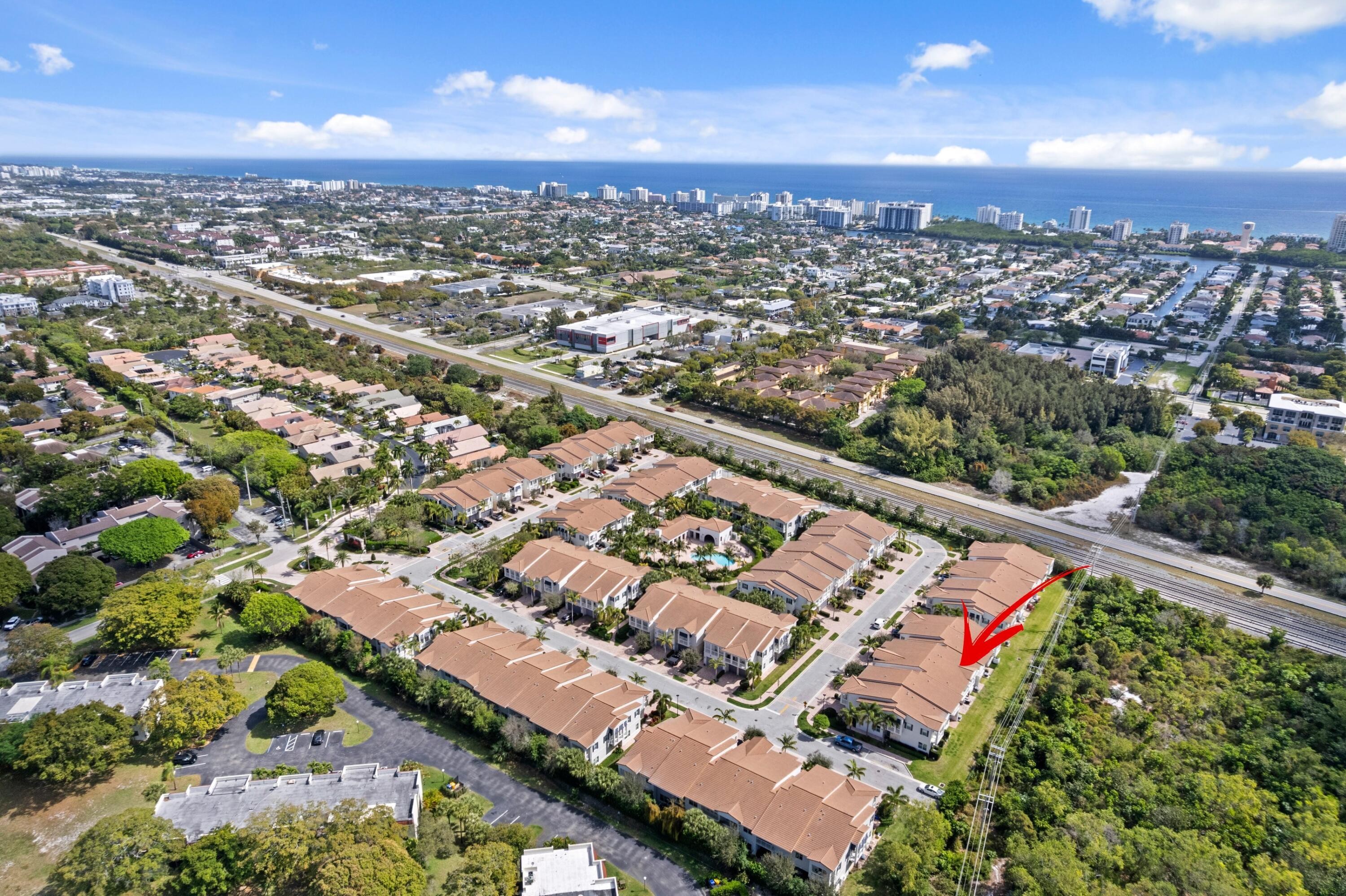 100 Northwest 69th Circle, Unit 82 Boca Raton, FL 33487 - Photo 3 of 42 an aerial view of a city