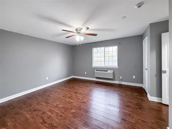 a bathroom with a sink a mirror and a vanity