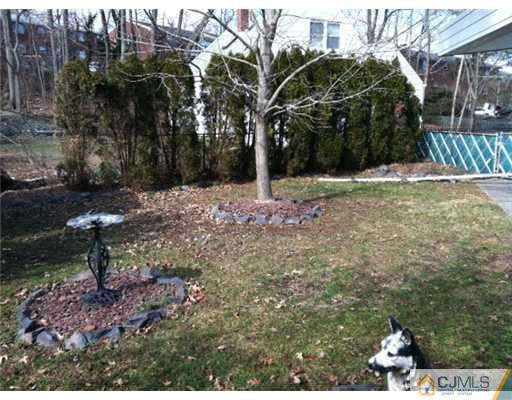 52 Tunison Road New Brunswick, NJ 08901 - Photo 17 of 17 a backyard of a house with lots of green space