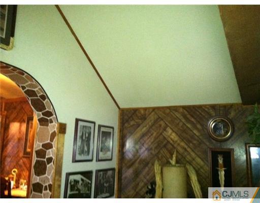 52 Tunison Road New Brunswick, NJ 08901 - Photo 5 of 17 a view of entryway with wooden floor