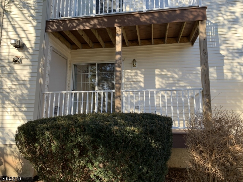 13 Potomac Drive, Unit 13 Bernards, NJ 07920 - Photo 14 of 16 a view of a house with a flower garden