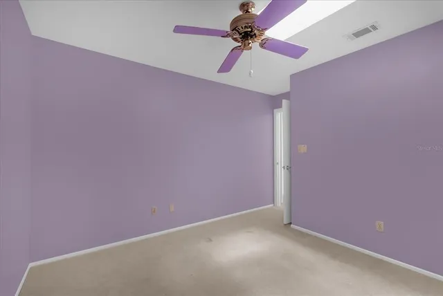 a view of a small space with a fan