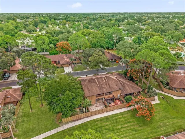 an aerial view of a house with garden