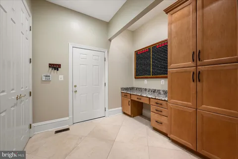 a bathroom with a shower and a sink