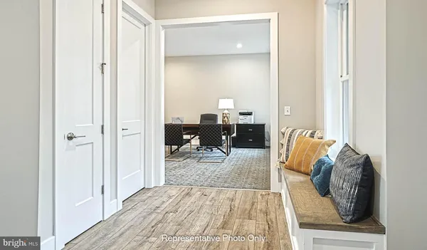 a living room with furniture and a table