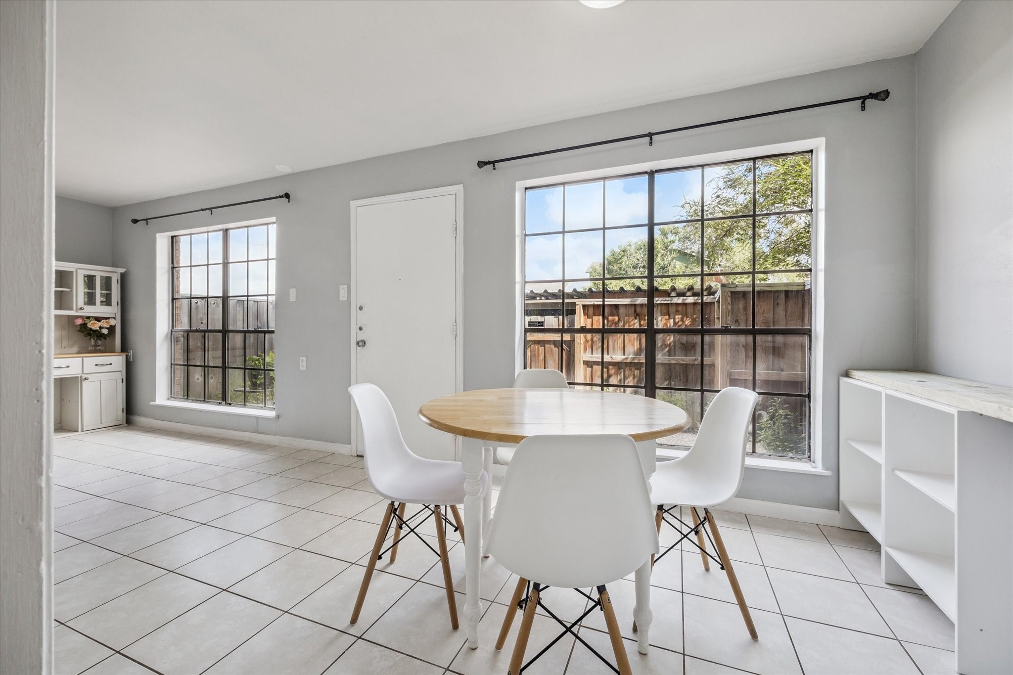 6517 Wanda Lane Houston, TX 77074 - Photo 12 of 36 The kitchen opens to a bright and cheery second living/dining area! Two large windows let natural light pour into the room.