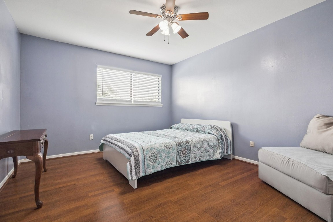 6517 Wanda Lane Houston, TX 77074 - Photo 17 of 36 Upstairs, this is the first of three large bedrooms. All bedrooms have large closets! There are two storage closets upstairs in the hallway also.