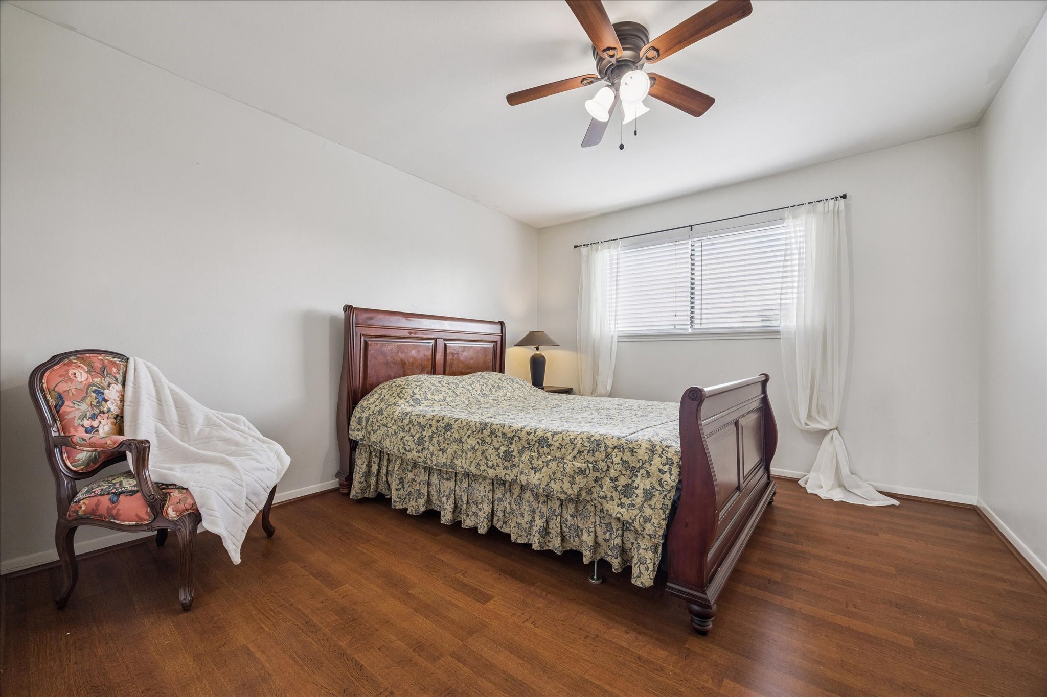 6517 Wanda Lane Houston, TX 77074 - Photo 18 of 36 This is the second bedroom. All bedrooms have ceiling fans and laminate wood flooring. No carpet!