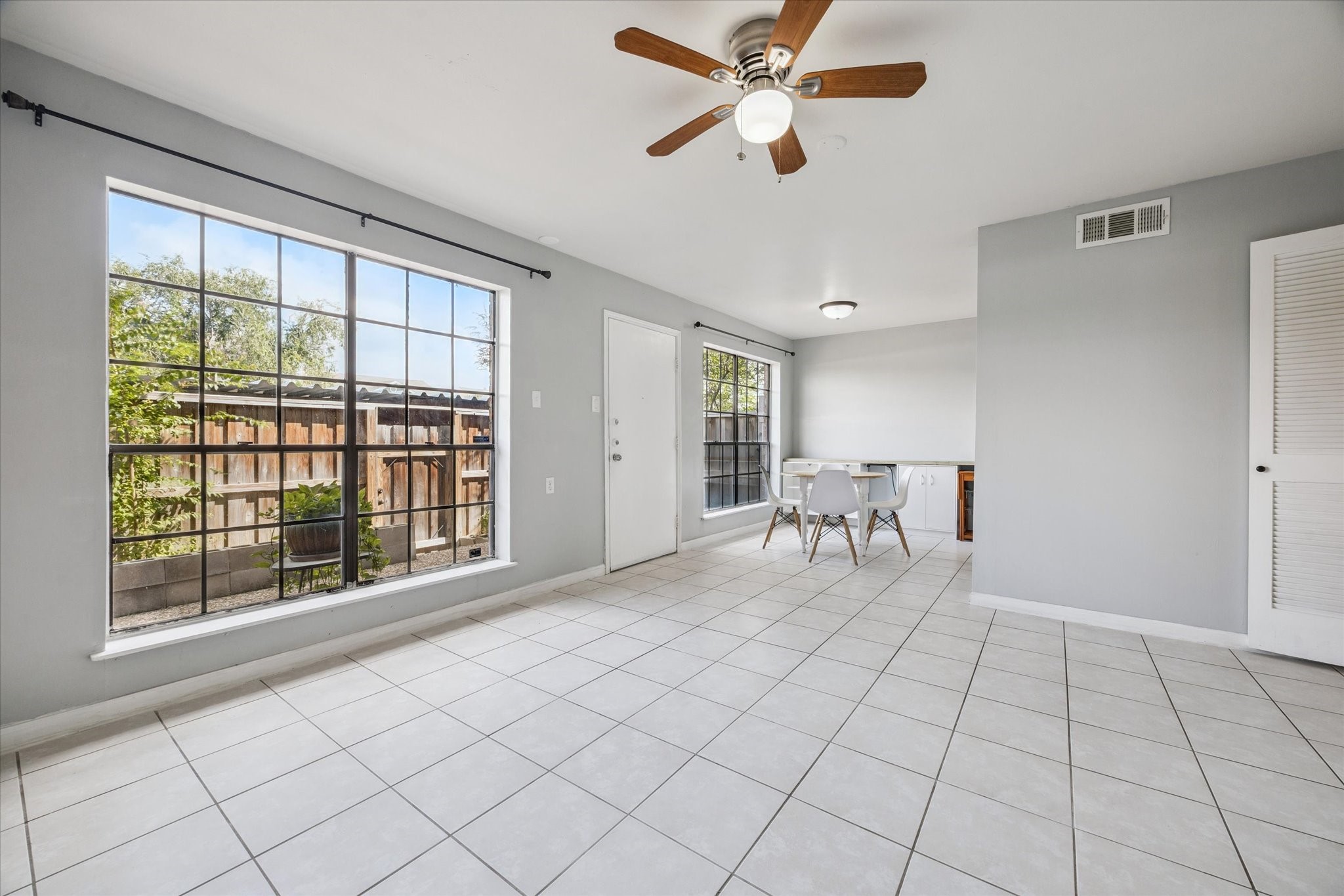 6517 Wanda Lane Houston, TX 77074 - Photo 29 of 36 Back downstairs – another view of the sunny den and breakfast area. Let’s take a look outside next.