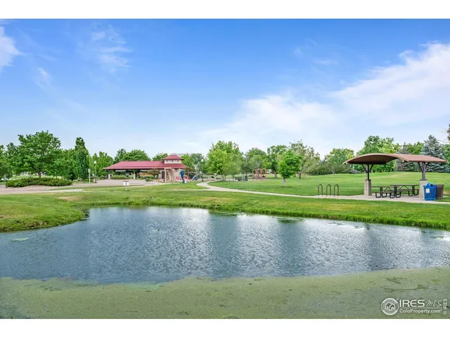 a view of a golf course with a lake