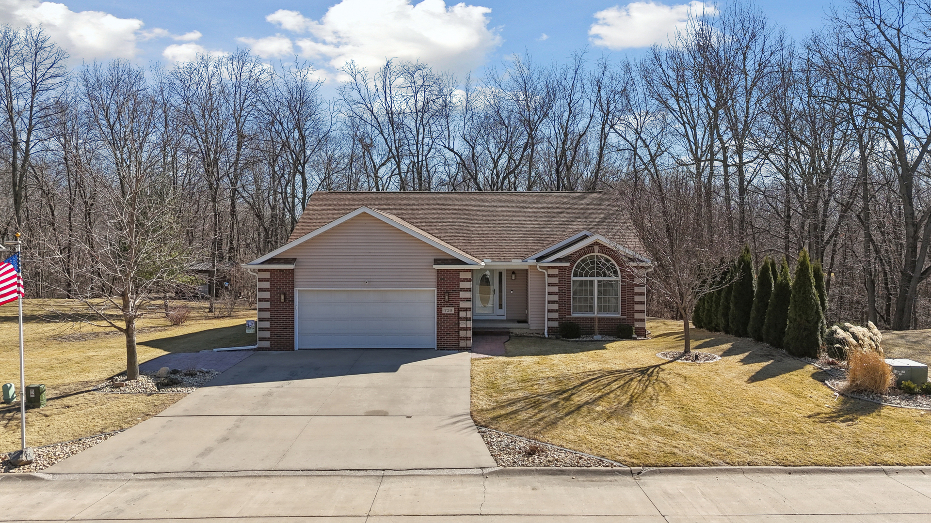 728 10th Ave Court Hampton, IL 61256 - Photo 27 of 35 a view of a house with a yard covered in snow