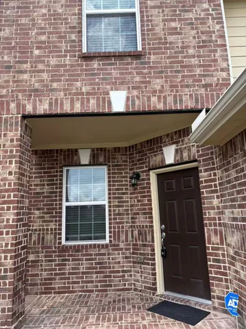 a front view of a house with a window