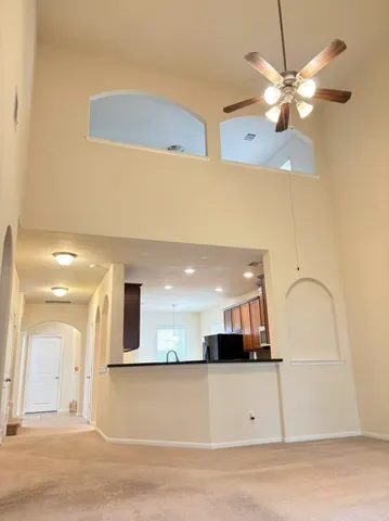 a view of living room with a large window