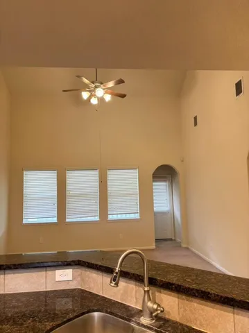 a view of a livingroom with furniture